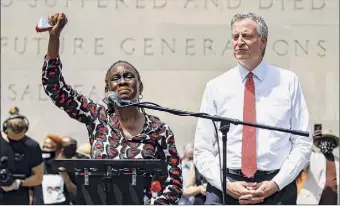  ?? John Minchillo / AP ?? Chirlane Mccray — seen alongside her husband, New York City Mayor Bill de Blasio, at a June memorial service for George Floyd — has spearheade­d a mental health initiative.