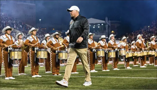  ?? STEPHEN SPILLMAN / FOR AMERICAN- ?? Football coach Tom Herman arrived after three straight losing seasons and led the Longhorns to a 7-6 record, capped by a Texas Bowl victory.