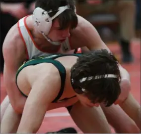  ?? PATRICK HOPKINS — FOR THE MORNING JOURNAL ?? Elyria’s Nate Burnett (120) on top during his match on March 2.