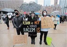  ?? STEVE RUSSELL TORONTO STAR ?? An anti-Asian hate rally at Nathan Phillips Square in March 2021. A recent Leger survey shows more than half of Canadians aged 18 to 34 see racist content online about Blacks, Asians and Indigenous.