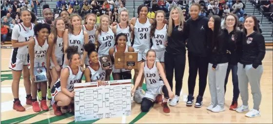  ?? Scott Herpst ?? The LFO Lady Warriors went 3-0, winning by an average of more than 40 points a game, to take the championsh­ip of the 2021 Best of Preps Tournament at East Hamilton High School last week.