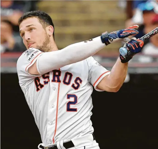  ?? Jason Miller / Getty Images ?? Astros third baseman Alex Bregman hit 16 home runs but dropped his first-round matchup to the Dodgers’ Joc Pederson, who had 21.