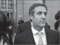  ?? The Associated Press ?? RECORDING EMERGES: Michael Cohen leaves federal court on April 26 in New York. President Donald Trump’s former personal lawyer secretly recorded Trump discussing payments to a former Playboy model who said she had an affair with him, The New York Times...