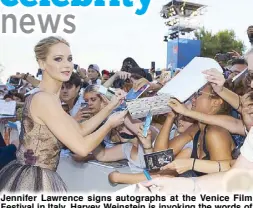  ?? AP ?? Jennifer Lawrence signs autographs at the Venice Film Festival in Italy. Harvey Weinstein is invoking the words of Lawrence in his defense.