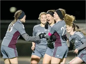  ?? Ben Goff/NWA Democrat-Gazette ?? Siloam Springs girls soccer players, from left, Shelby Johnson, Hailey Dorsey, Meghan Kennedy, Megan Hutto and Jaleigh Harp of Siloam Springs celebrate after scoring a goal against Rogers on March 6. The Lady Panthers (7-2-2) return to action Monday at...