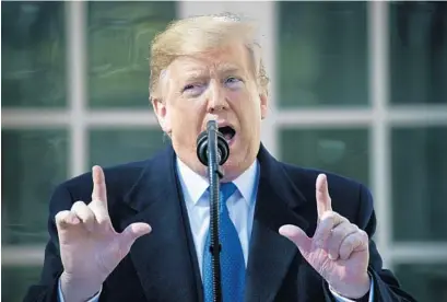  ?? EVAN VUCCI/AP ?? President Donald Trump speaks at the White House to declare a national emergency in order to build a wall along the southern border.