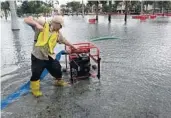  ?? JIM RASSOL/STAFF FILE PHOTO ?? Palm Beach County officials and property owners are still waiting for final versions of FEMA’s revised flood maps.