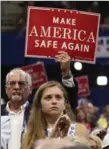  ?? DAMON WINTER, THE NEW YORK TIMES ?? Audience members take part in the Republican convention Monday.