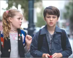  ??  ?? This image released by Netflix shows Darby Camp, left, and Gabriel Bateman a scene from “Benji.”