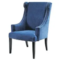  ?? TARGET ?? Marcel High Back Wing Chair in blue, adds a note of authentici­ty to your farmhouse-themed design. (US$300: intl.target.com).