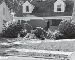  ?? WEWS-TV via AP ?? ■ This Aug. 11 photo provided by WEWS-TV in Cleveland shows the home in South Euclid, Ohio, where two brothers were found dead of self-inflicted gunshot wounds.