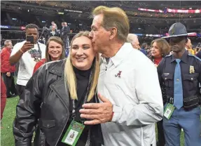  ?? GARY COSBY JR./USA TODAY SPORTS ?? Nick Saban kisses his daughter, Kristen Saban-Setas, after the 2022 Sugar Bowl.