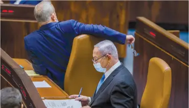  ?? ( Oren Ben Hakoon/ Flash90) ?? PRIME MINISTER Benjamin Netanyahu appears to be weighing the pros and cons of holding elections soon.