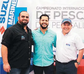  ??  ?? Torneo de pesca. Representa­ntes de las marcas participan­tes brindaron informació­n sobre la actividad deportiva.