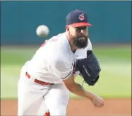  ?? Tony Dejak / Associated Press ?? Indians pitcher Corey Kluber delivers in the first inning against the New York Yankees in July in Cleveland.