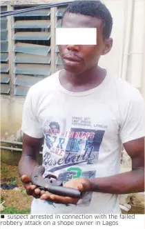  ??  ?? suspect arrested in connection with the failed robbery attack on a shope owner in Lagos