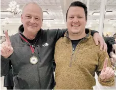  ?? ?? Richard Gosselin, left, poses with his personal trainer and coach, Matt Goldsmith. Goldsmith has helped Gosselin to improve his technique and to break his personal records.