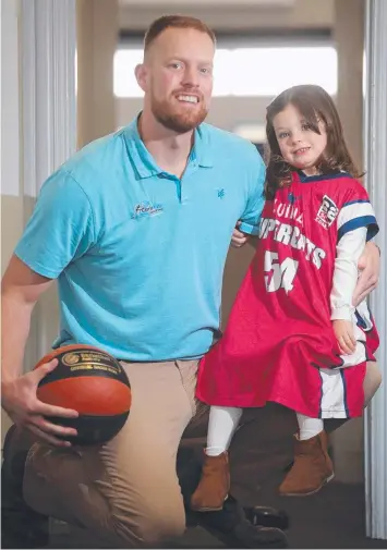  ?? Picture: ALISON WYND ?? LAST HURRAH: Supercat Ash Cannan, with three-year-old daughter Mia, will retire at season's end and will play his last regular home game on Saturday.