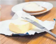  ?? FOTO: DPA ?? Ohne Butter fehlt etwas auf dem Brot: Auch billige Produkte schnitten bei einem Test der Stiftung Warentest gut ab.