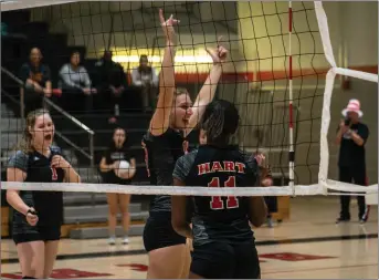  ?? Cory Pitkavish/For The Signal ?? (Above) Hart’s Shelby Grubbs (67) and Ashley Cosey celebrate after scoring against Woodrow Wilson of Long Beach on Tuesday. (Below) Hart’s Megan Soto (9) keeps the ball in play during their home game on Tuesday.