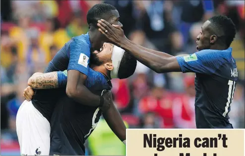  ?? GETTY IMAGES ?? France’s Paul Pogba (left) celebrates scoring his team’s second goal with Olivier Giroud and Anthony Martial Saturday against Australia in Group C action.