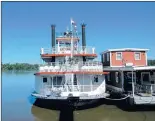  ??  ?? A riverboat is docked in Hannibal, Mo., on the Mississipp­i River.