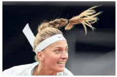  ?? — AP ?? Easy: Second seed Petra Kvitova of the Czech Republic sees off Caroline Garcia of France 6-3, 6-3 in the third round of the Madrid Open on Wednesday.