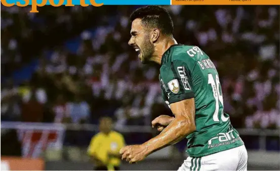  ??  ?? O volante Bruno Henrique comemora após marcar no jogo de estreia do Palmeiras na Libertador­es deste ano contra o Júnior Barranquil­la, na Colômbia