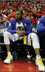  ?? The Associated Press ?? IGGY OUT: In this May 16 file photo, Golden State Warriors forward Andre Iguodala (9) sits on the bench during the final moments of the second half in Game 2 of the NBA Western Conference Finals against the Houston Rockets, in Houston. Iguodala will be...