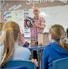  ?? DOMINICO ZAPATA/FAIRFAX NZ ?? Cambridge man Geoff Bentley chats about a holographi­c computer to students at MindPlus in Hamilton, in 2016.