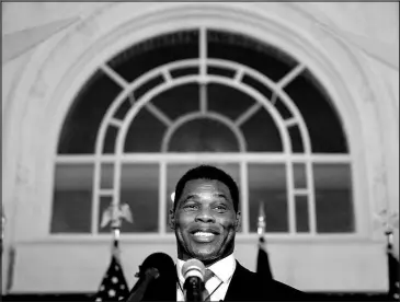  ?? BRYNN ANDERSON / ASSOCIATED PRESS ?? Senate candidate Herschel Walker speaks to supporters May 24 in Atlanta.