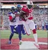  ??  ?? KENT NISHIMURA/GETTY Images Miami’s Brandon Marshall scores a TD during the NFL Pro Bowl Sunday in Honolulu The AFC beat the NFC 59-41.