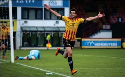  ??  ?? Brian Graham celebrates after scoring his second of the match to make it 4-0 to Partick Thistle