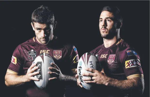  ?? Picture: GETTY IMAGES ?? CONNECTED: Andrew McCullough and Ben Hunt will play for the Maroons together for the first time next week, but are no strangers on the footy field.