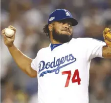  ??  ?? Dodgers closer Kenley Jansen credits Mike Borzello with helping him turn his four- seam fastball into a major- league weapon.
| GETTY IMAGES