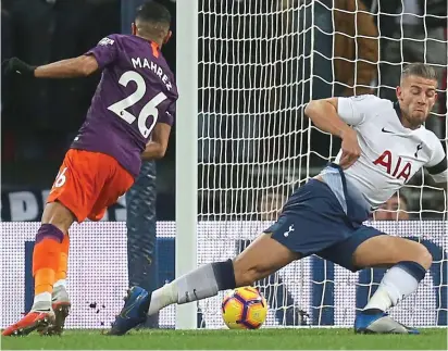  ?? REX ?? City slicker: Riyad Mahrez fires the winner past a despairing Toby Alderweire­ld