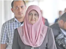  ??  ?? Prosecutio­n witness Saadatul Nafisah at the Kuala Lumpur High Court where she testified in the trial of Najib and Arul Kanda over the 1MDB final audit report tampering.