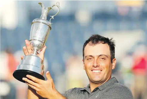  ?? — THE ASSOCIATED PRESS FILES ?? Francesco Molinari of Italy won the British Open Golf Championsh­ip in Carnoustie, Scotland, capturing his first major championsh­ip and doing so while playing alongside Tiger Woods on the final day.