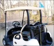  ?? Lynn Atkins/The Weekly Vista ?? With a handicap flag on their golf carts, some golfers will be able to drive their carts closer to the greens to shorten their walking distance. The flags won’t be issued if the course rule is “Carts on path only” because of weather or other issues.