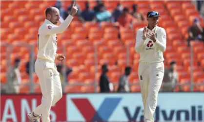  ?? Photograph: Aijaz Rahi/AP ?? England’s Jack Leach (left) finished the series with 18 wickets.