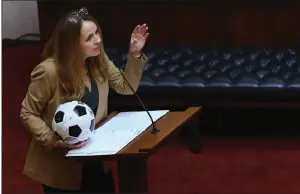  ?? (Arkansas Democrat-Gazette/Thomas Metthe) ?? Sen. Missy Irvin holds a soccer ball Wednesday while speaking about Senate Bill 354, which she said was “designed to create fairness in women’s sports.”