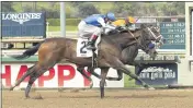  ?? BENOIT PHOTO ?? Beautiful Gift (2) and jockey John Velazquez win the Grade III $100,000 Santa Ysabel Stakes on Sunday at Santa Anita.