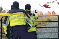  ?? KEITH GOSSE/THE TELEGRAM ?? Investigat­ors and police search search an open area off O’brien’s Farm Road in St. John’s Saturday afternoon.