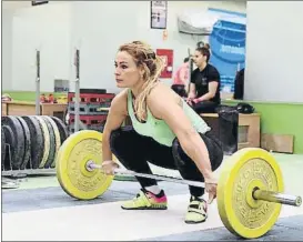  ??  ?? Lydia Valentín es, por segundo año seguido, la mejor halterófil­a del mundo para la IWF