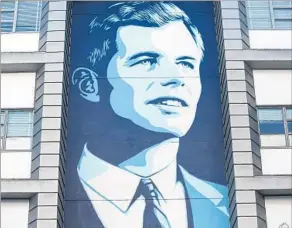  ??  ?? A COMMISSION­ED mural by noted artist Shepard Fairey of school namesake Kennedy, who was assassinat­ed on the site in 1968 when it was the Ambassador Hotel.