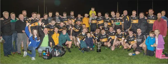  ?? Austin Stacks players and supporters celebrate after winning the Tommy Barrett Memorioal Cup at Caherslee on Friday evening. Photo by Joe Hanley ??