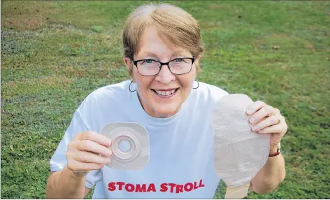  ?? JIM DAY/THE GUARDIAN ?? Christine MacCallum of Marshfield holds up some of the ostomy supplies that cost her $300 to $500 per month. She is helping to organize an event Saturday called the Stoma Stroll to raise funds and awareness.