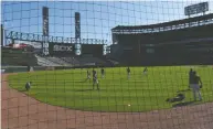  ?? DAVID BANKS / GETTY IMAGES ?? The Chicago White Sox are one of two teams to extend netting down to the foul poles on each side of the field.