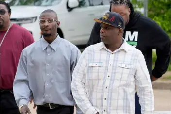  ?? ROGELIO V. SOLIS — THE ASSOCIATED PRESS ?? Michael Corey Jenkins, left, and Eddie Terrell Parker walk toward the Thad Cochran United States Courthouse in Jackson, Miss., Thursday, March 21, 2024, for sentencing on the fifth of the six former Mississipp­i Rankin County law enforcemen­t officers who committed numerous acts of racially motivated, violent torture on them in 2023. The six former law officers pleaded guilty to a number of federal charges for torturing them and their sentencing began Tuesday in federal court.