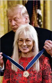  ?? OLIVIER DOULIERY / ABACA PRESS ?? President Donald Trump awards the Presidenti­al Medal of Freedom to Dr. Miriam Adelson at the White House on Nov. 16 in Washington, D.C. The Medal of Freedom is the highest civilian award of the U.S.